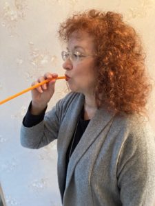 Karen playing plastic straw